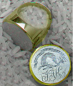 http://motheropearl.com/Rob_KennedySignet%20Ring.jpg